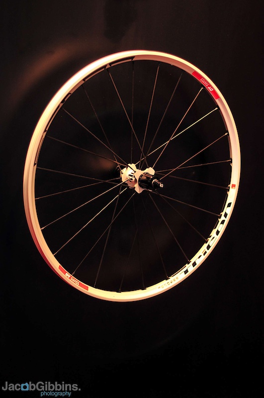 The last wheels we're going to show you are the Tricon series. Two options with these, the XM1550 and the M1700. Whilst both feature the same basic architecture the hubs differ in their construction, the lighter option being of a three piece design to help to prevent spokes having the effect of pulling the hub body out of shape and affecting the bearings, causing drag. Both wheels feature the same 26mm rim which features clip in chips to hold the spokes into the undrilled, tubeless compatible, double wall rim.