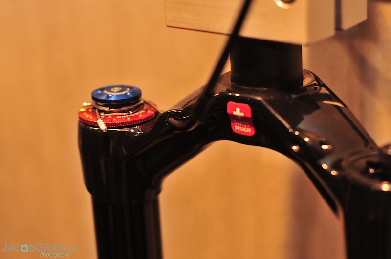 Three dampers are found on the DT line up. The first is an ultra light design called Single Shot. This features external low speed rebound LSR adjustment and compression lockout with internally adjustable high and low speed compression HSC and LSC and high speed rebound HSR. The damper seen in this picture is the Twin Shot and features externally adjustable LSR and LSC with three settings of lockout fully open, lowered and closed. The lowered position is an option that locks out the rebound at 70 percenttravel and helps keep the front end height in check when the travel isn't needed during climbs or on smooth trails.